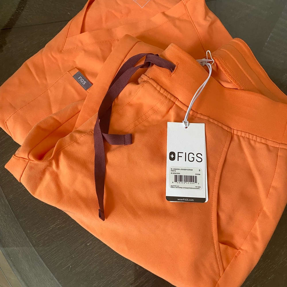 Figs women’s orange Catrina scrub top and Zamora jogger pant set